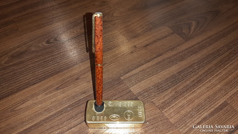 Ballpoint pen in the shape of a gold bar