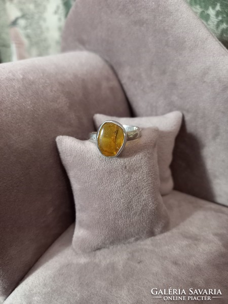 Silver ring with Polish amber enclosing a beetle