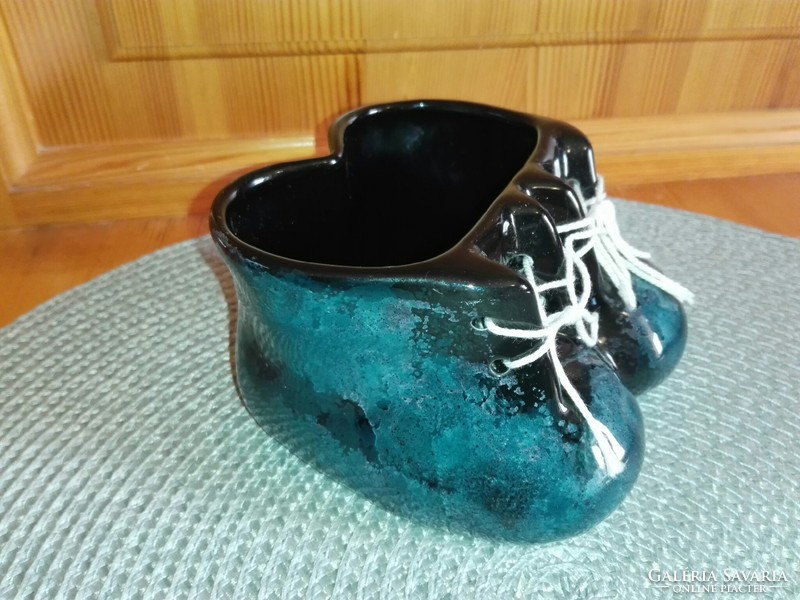 Glazed ceramic, turquoise little shoes.