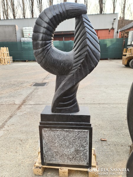 Black abstract non-figurative marble sculpture