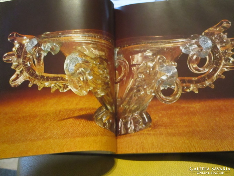 A very rare magnificent glass book with a plethora of photos and a description of 250 objects in a 1974 edition