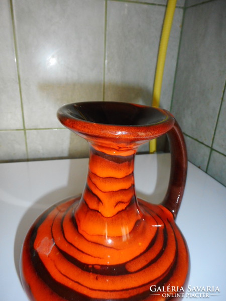 Red and black retro ceramic jug