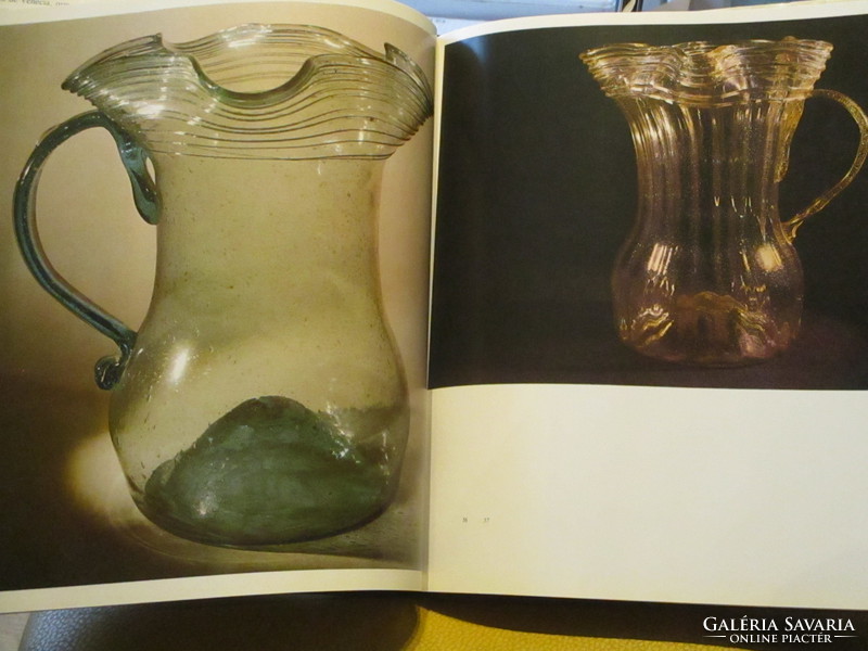 A very rare magnificent glass book with a plethora of photos and a description of 250 objects in a 1974 edition