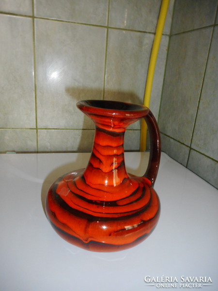 Red and black retro ceramic jug