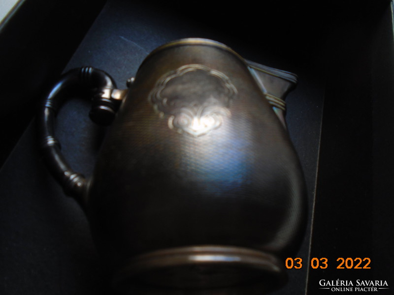 19.So christofle guilloche silver-plated patinated numbered cream spout with baluster pliers