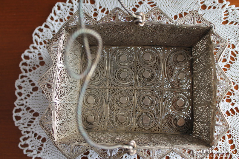 Silver filigree basket made of twine