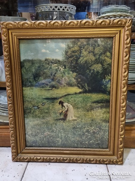 Reproduction in gilded frame