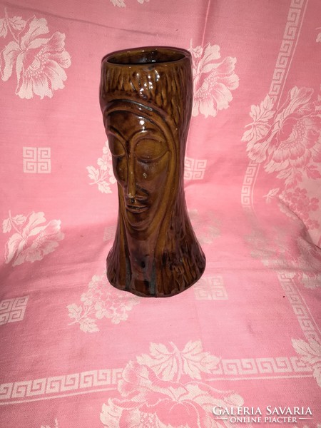 Ceramic vase imitating wood carving