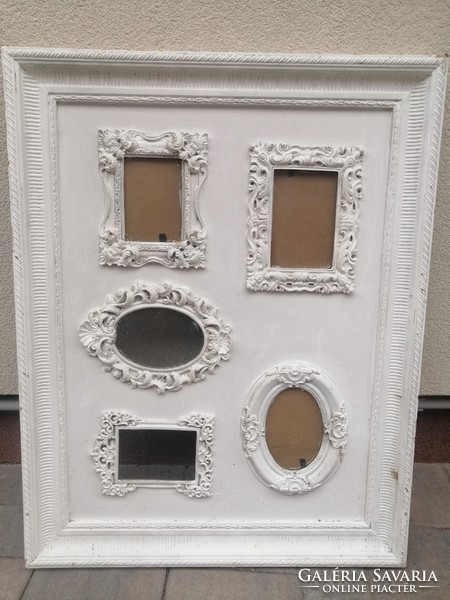 Vintage picture frame with several picture holders. Negotiable!