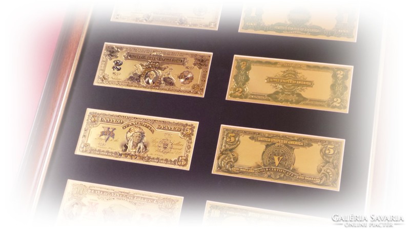 Historical dollars plated with gold and nicely framed