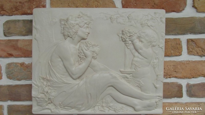 A stone tablet depicting a young bacchus, relief,