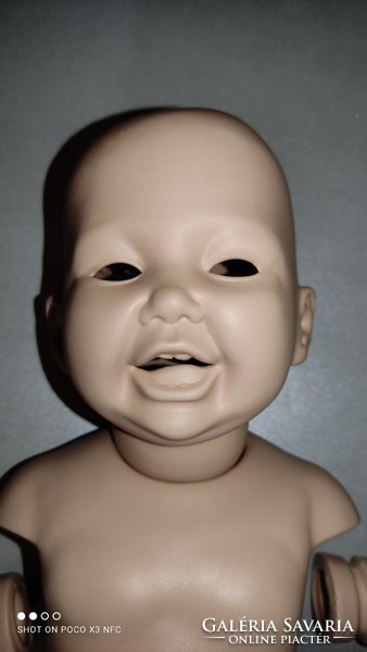 Porcelán jelzett baba fej végtagok