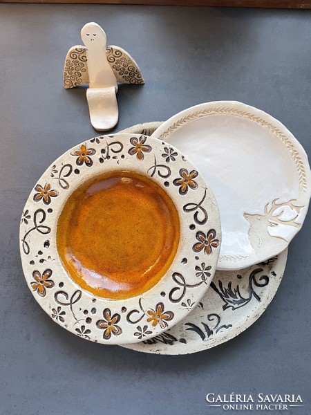 Handcrafted ceramic plate with amber glaze
