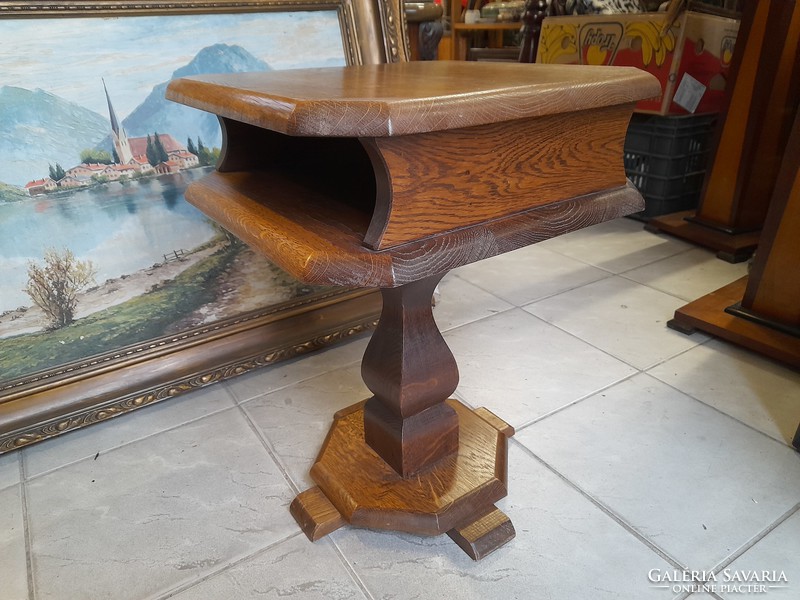 Eclectic solid wood storage table.