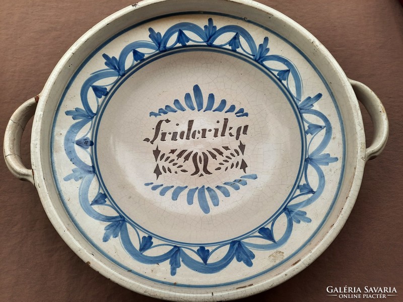 Tin glazed bowl with friderika inscription