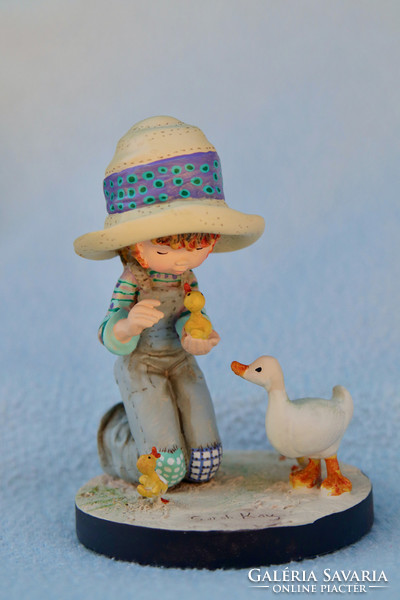 Little girl with ducks. Sarah kay statue with certificate