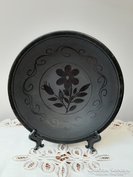 Coral flower motif on black sword ceramic wall plate
