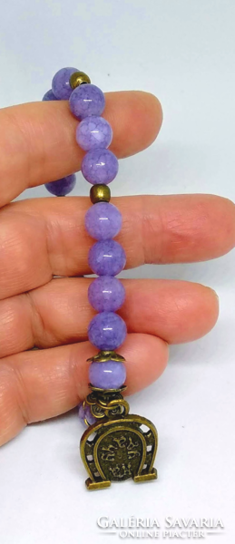 Purple jade bracelet with lucky horseshoe pendant
