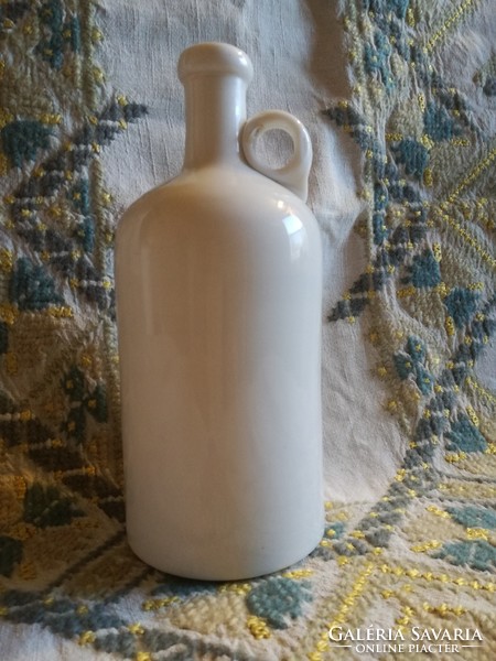 Antique blown milk glass bottle