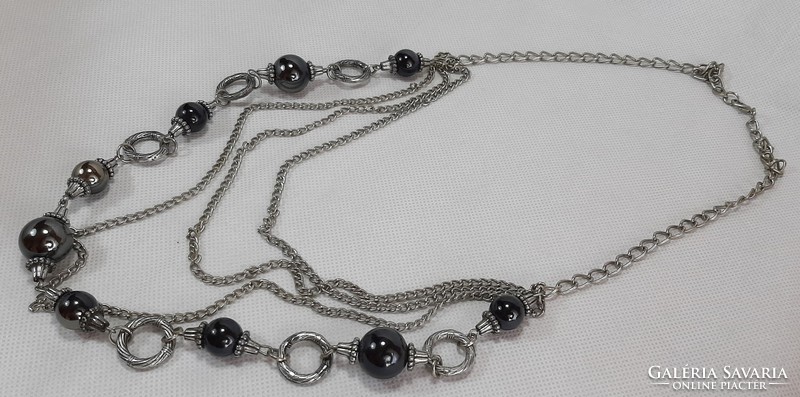 Four-row long black beaded necklace