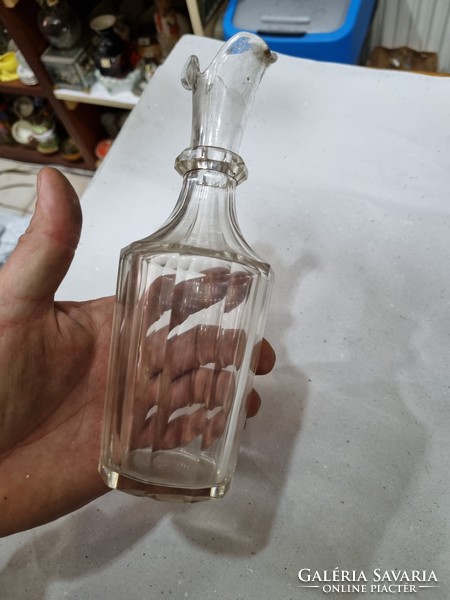 Old peeled crystal bottle