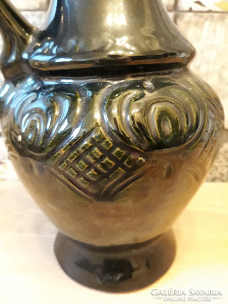 Dark green folk ceramic jug