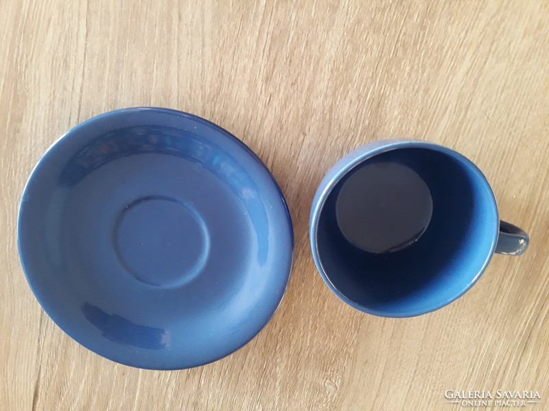 Blue ceramic coffee cup with saucer