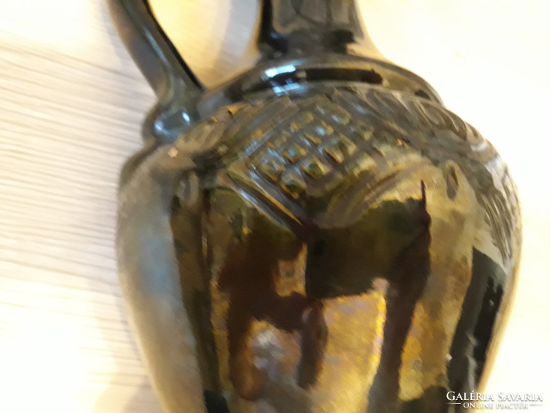 Dark green folk ceramic jug