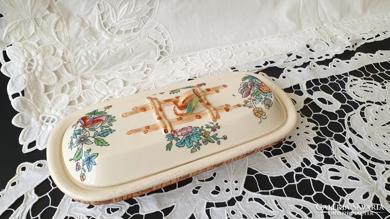 Antique, porcelain toothbrush or soap dish.