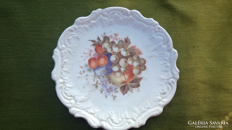 Beautiful fruit mot.Plate of the first half of the 1900s