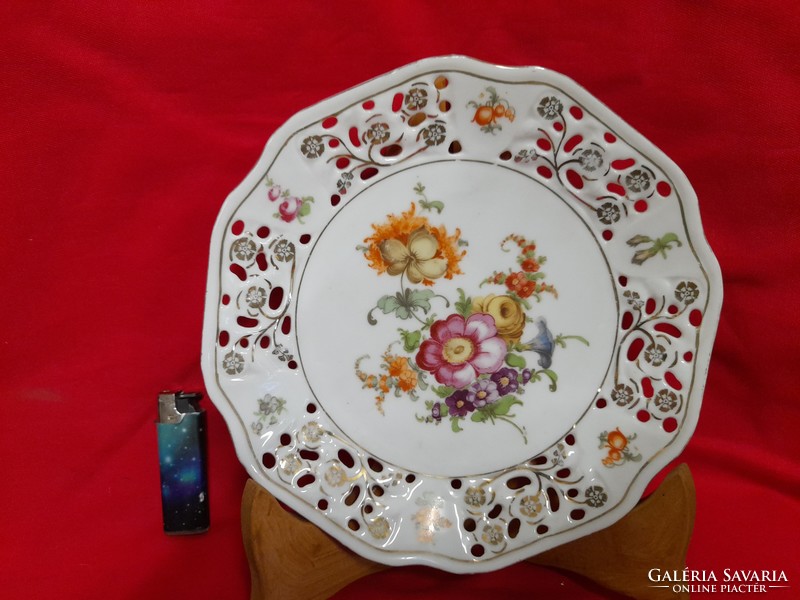 Old victorian plate with openwork floral pattern, serving.