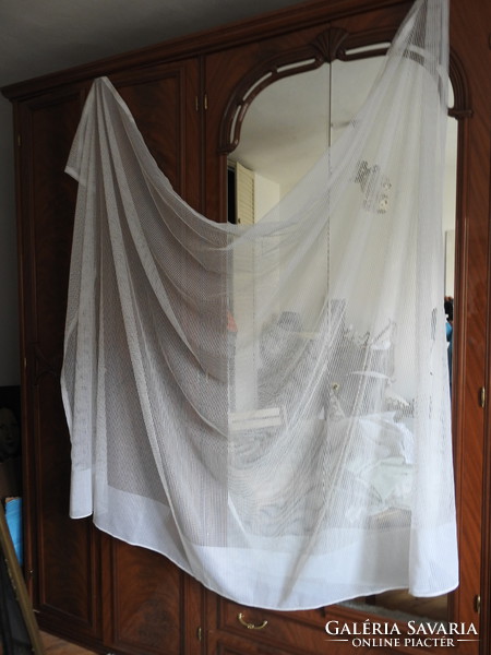 Eclipse lace curtain with square lattice pattern