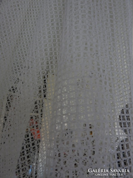 Eclipse lace curtain with square lattice pattern