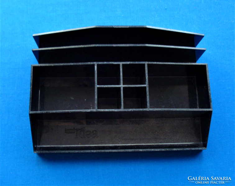 Retro, black plexiglass, stationery designer marketed by a crafts company