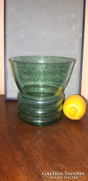 Large, hollow green glass vase