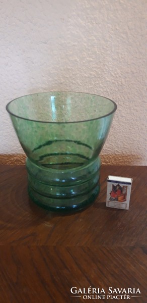 Large, hollow green glass vase