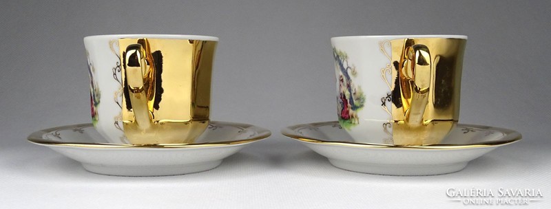 1I240 marked gilded porcelain coffee cup with a pair of painted figures