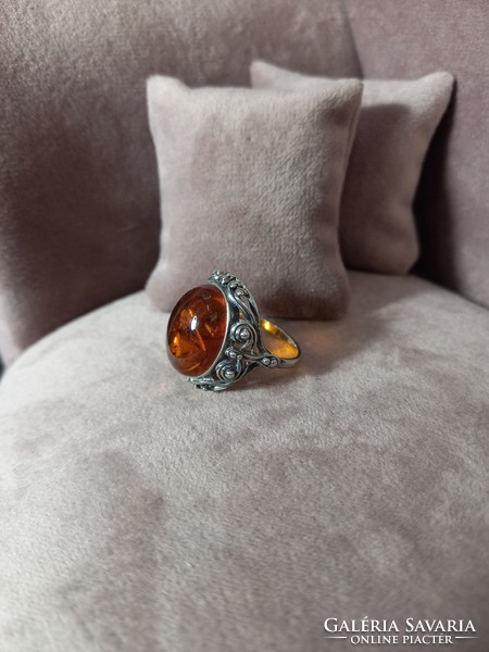 Antique silver ring with polish amber