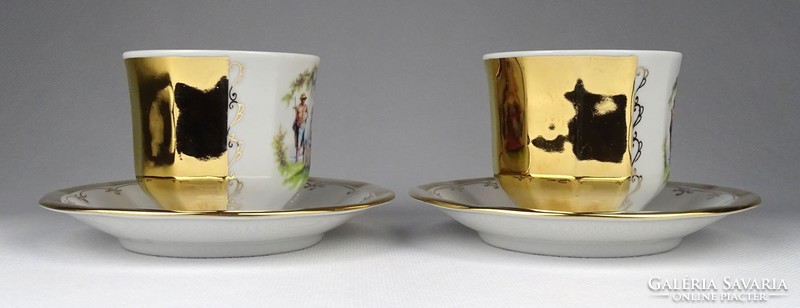 1I240 marked gilded porcelain coffee cup with a pair of painted figures