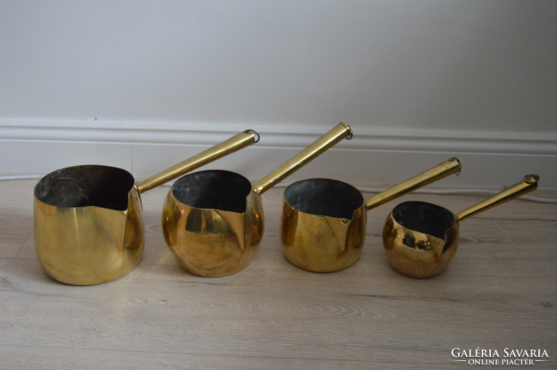 Set of 4 antique French copper pouring feet