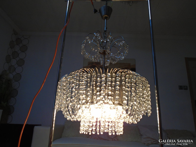 Beautiful glittering old round metal crystal chandelier in flawless perfect condition