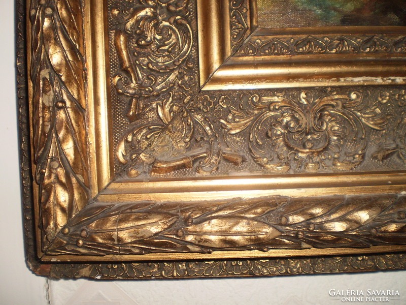 Painting in an antique picture frame