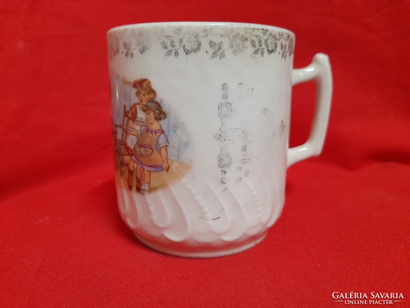 Antique children's patterned porcelain mug,