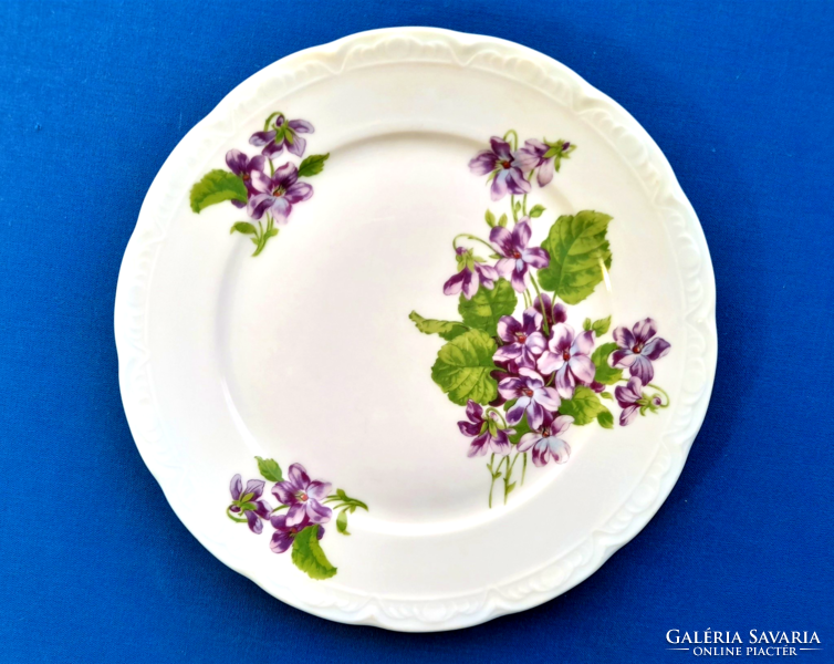 Offering old bavaria decorated with violet bouquet