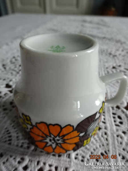 Raven house porcelain coffee cup with orange - brown pattern. He has!