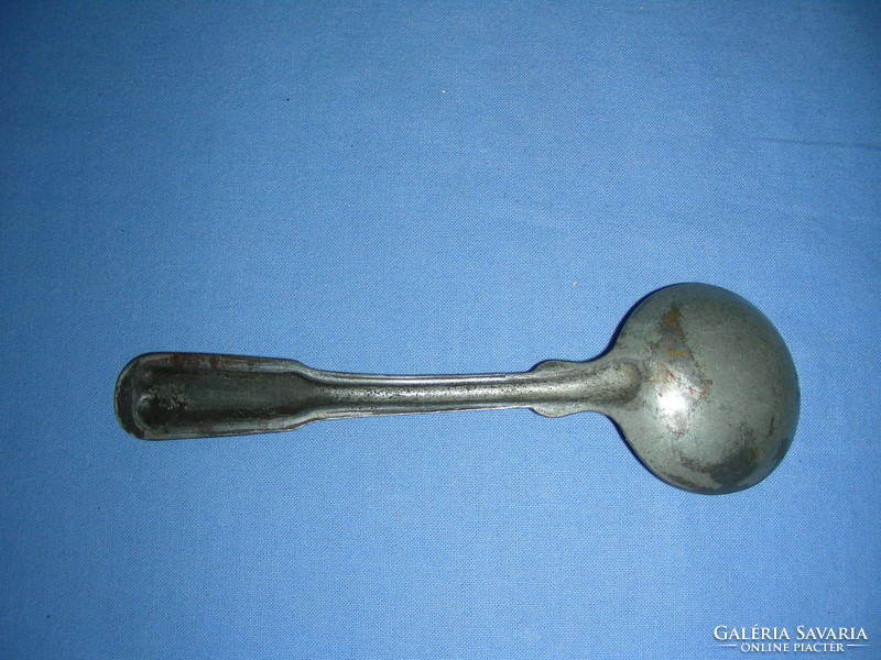 Antique aluminum children's spoon