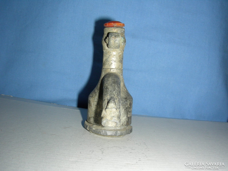 Lead soda bottle head