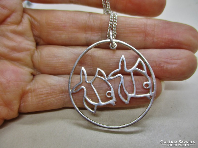 Beautiful handcrafted silver necklace with fish