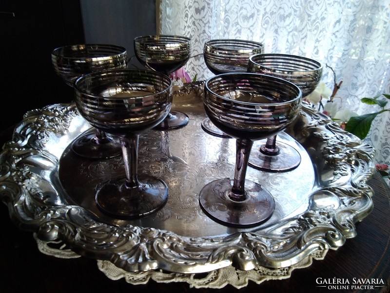 Liqueur-snaps smoky glass glasses with silver stripes running around.