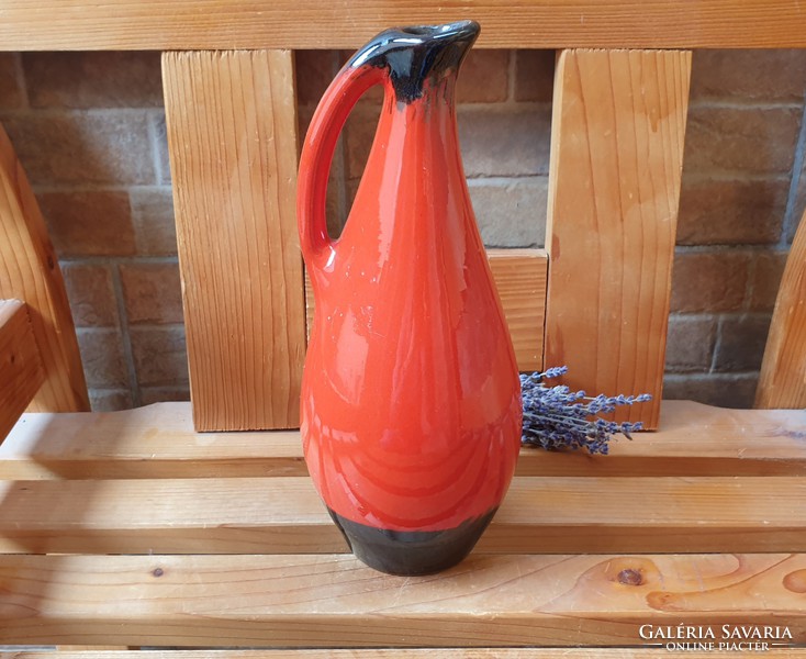 A vase pouring a rare brandy